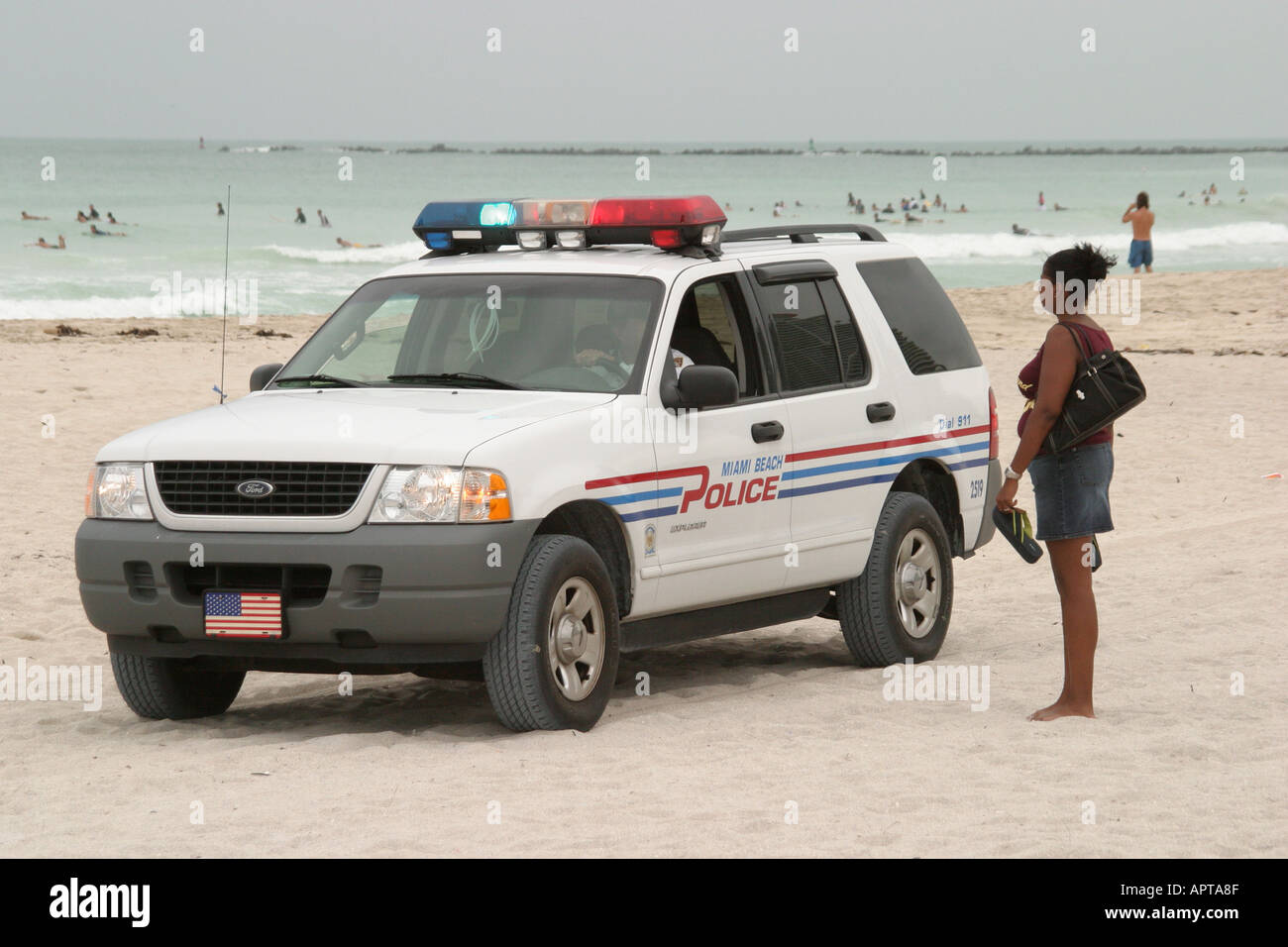 Miami Beach Florida,Atlantic Shore,shoreline,coast,coastline,seashore,weather,Hurricane Jeanne approaching,law enforcement,police SUV,warns,Black Blac Stock Photo