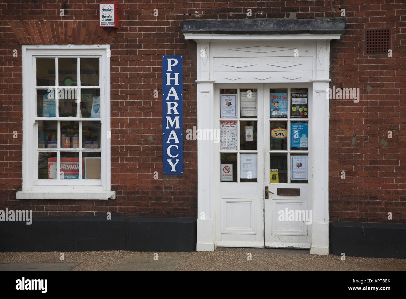 Village pharmacy chemist shop exterior Wickham Market, Suffolk, England