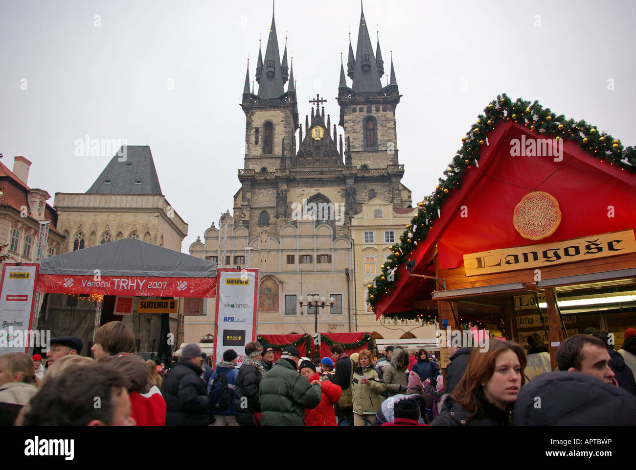 Old Town Square Christmas Market, Gothic twin-steepled Tyn Church in the background. Stock Photo