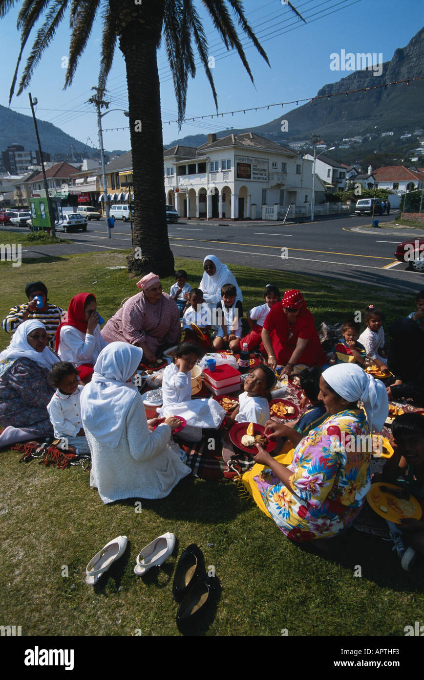 muslim women and children enjoying a picnic in Camps Bay Cape Town South Africa Stock Photo