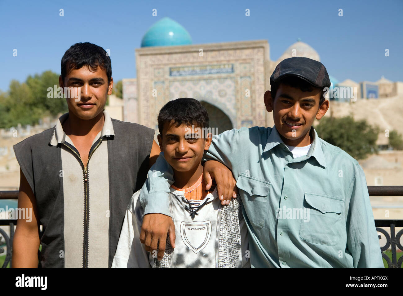 Youths in front of Shahr i Zindah in Samarkand Stock Photo