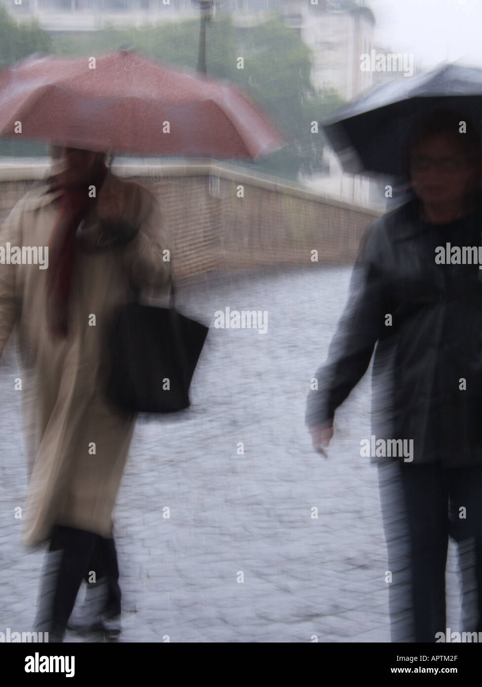 two people walking with umbrella Stock Photo - Alamy