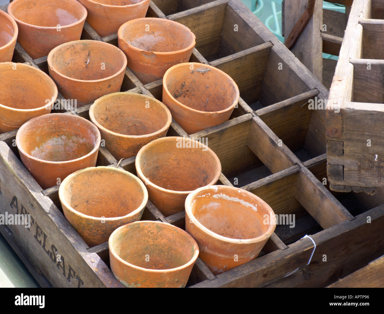 Wooden trays of old terracotta plant pots Stock Photo Alamy