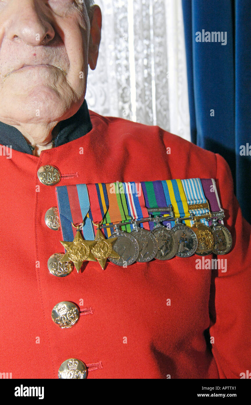 Chelsea pensioner in full dress uniform showing medals Stock Photo Alamy