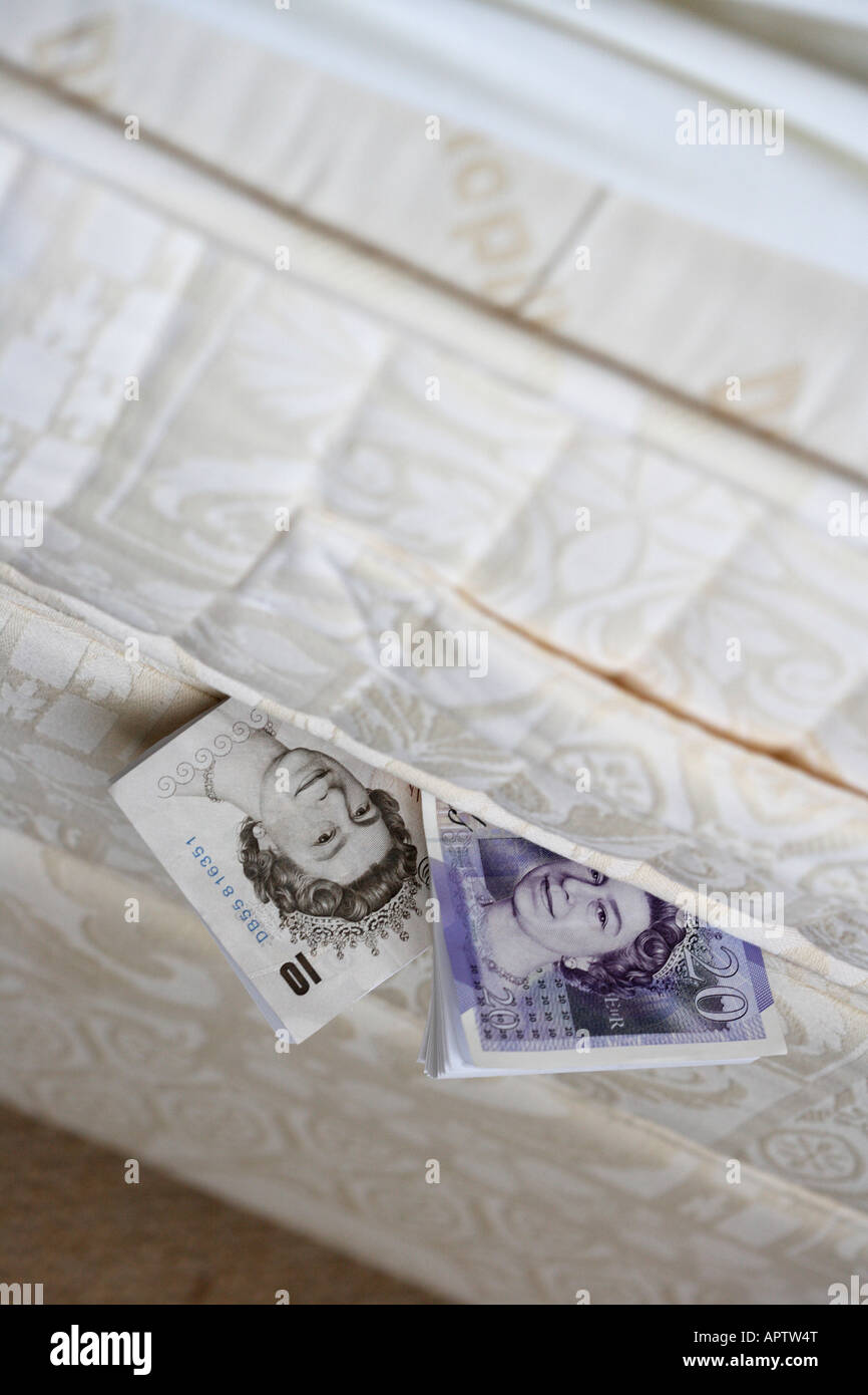 Money under the mattress Stock Photo Alamy