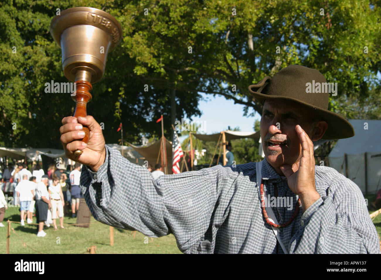 Miami Florida,Tamiami Park,Harvest Festival,festivals fair,regional historical reenactment,guide,costume,period clothing,docent,town crier rings bell, Stock Photo