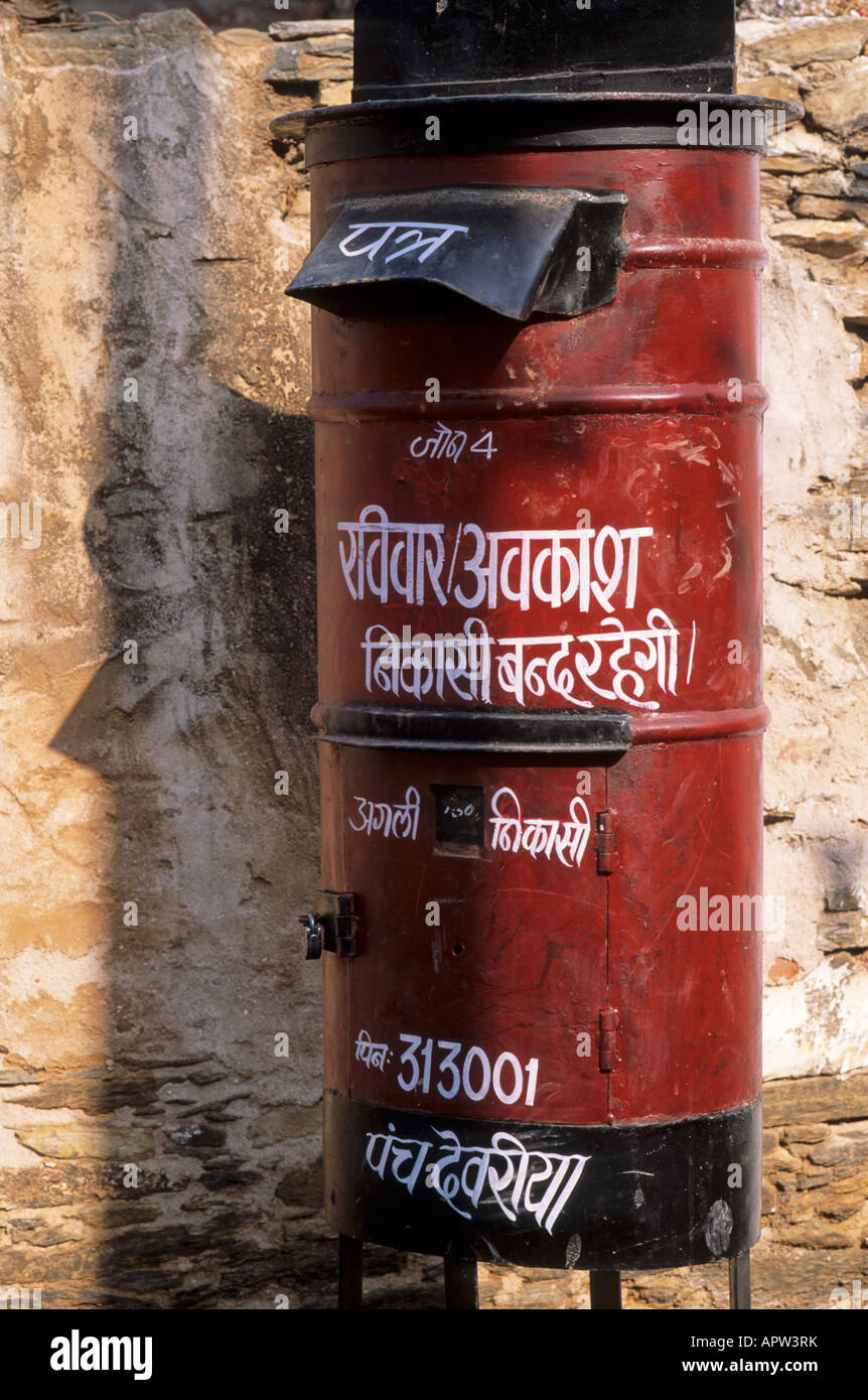 A traditional red mailbox, Udaipur IN Stock Photo