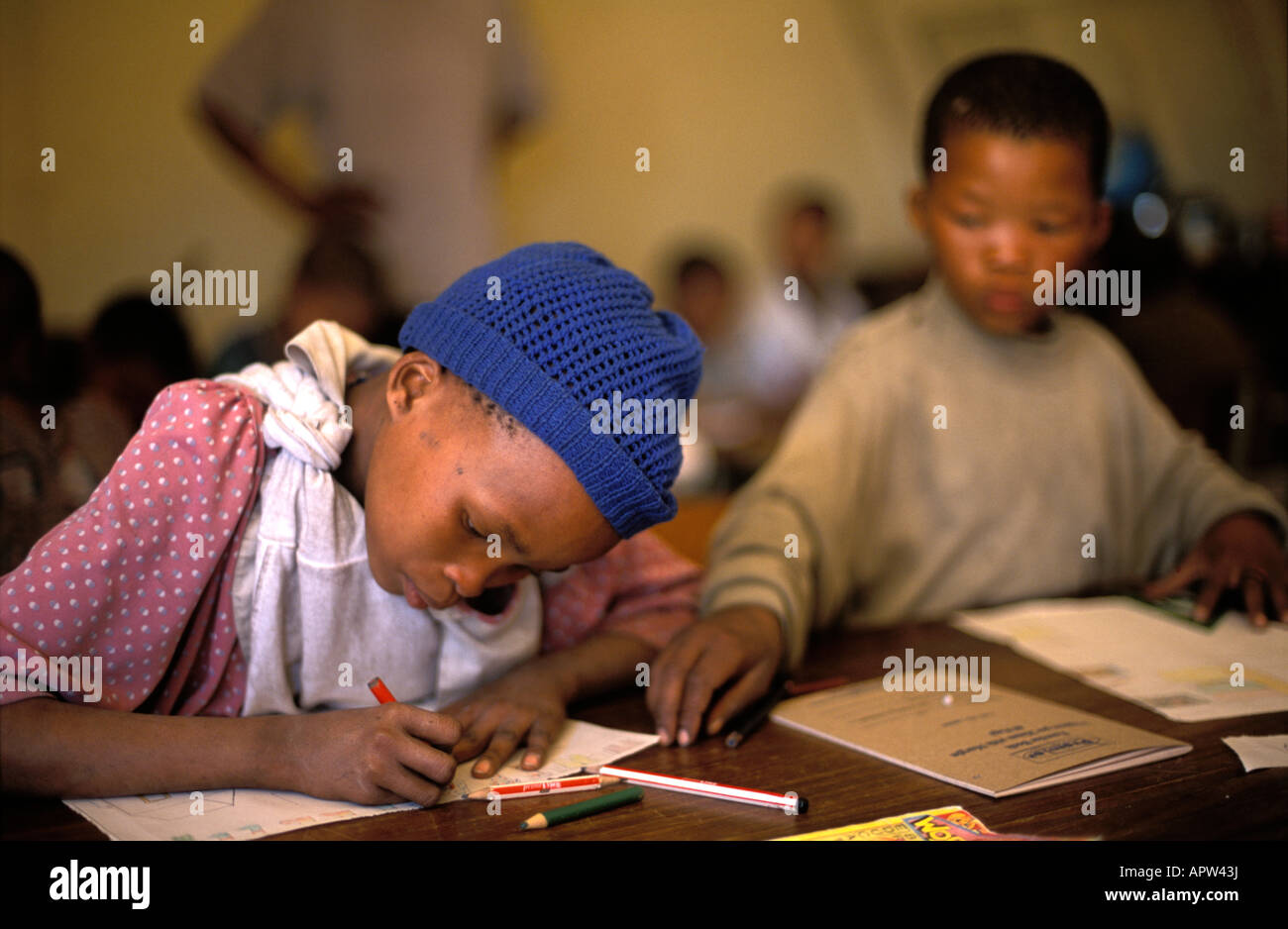 Bushman San children having classes in Den ui village school Bushmanland Namibia Stock Photo