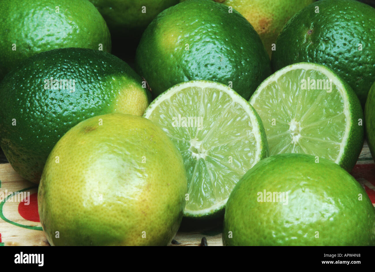 sweet limetta, Mediterranean sweet lemon, sweet lemon, sweet lime, pear lemon (Citrus limetta), fruits, cutted into halves Stock Photo