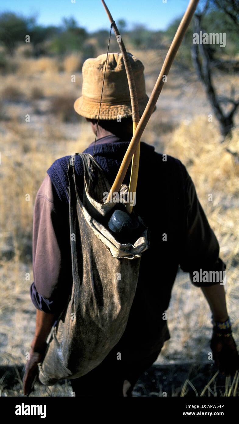 Fully armed Bushman hunter tracking an animal Namibia Stock Photo - Alamy