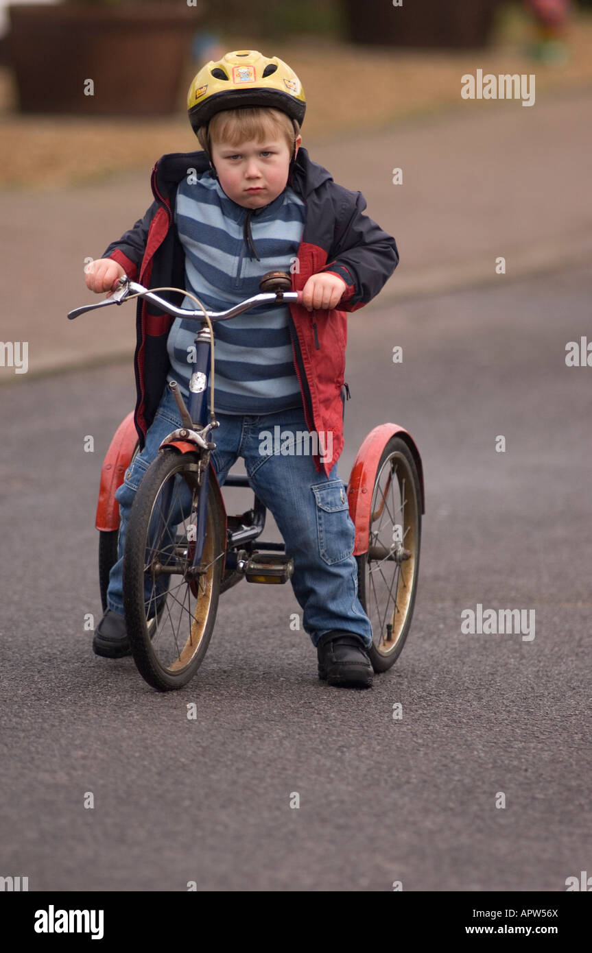 Four Year Old Boy On Tricycle Stock 