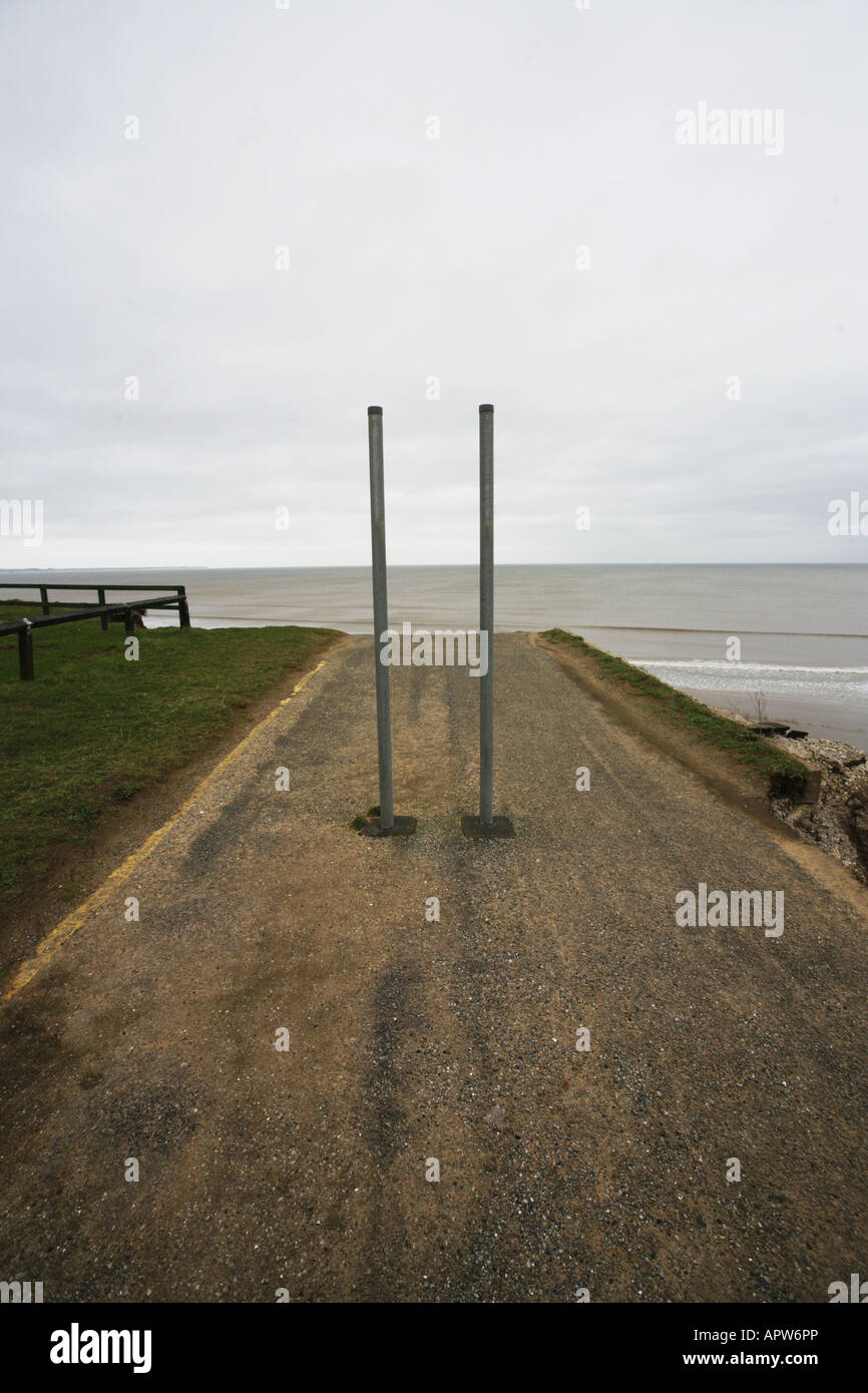 End of the Road. Coastal Erosion on the Yorkshire Coast between Bridlington and Hornsea. Road Collapse Stock Photo