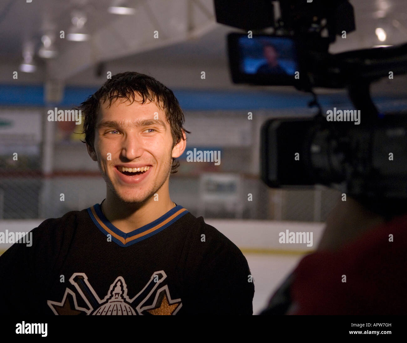 Alexander Ovechkin gives an interview to a TV channel crew from Canada after the Washington Capitals practice. Stock Photo