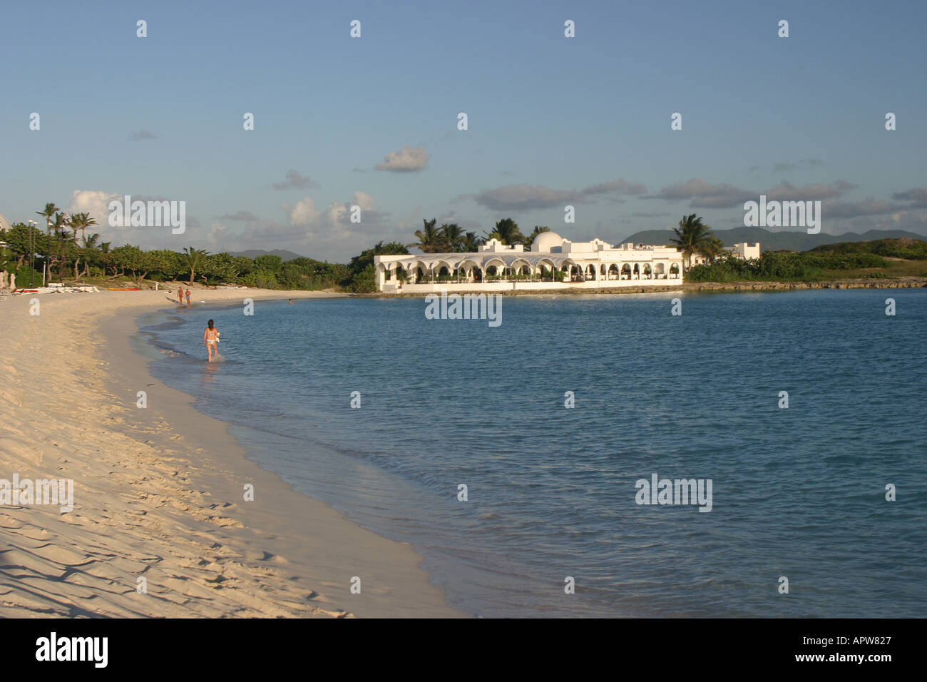 Beachside Pavillion On The Caribbean Island Of Anguilla With People Walking On The Beach Stock Photo Alamy