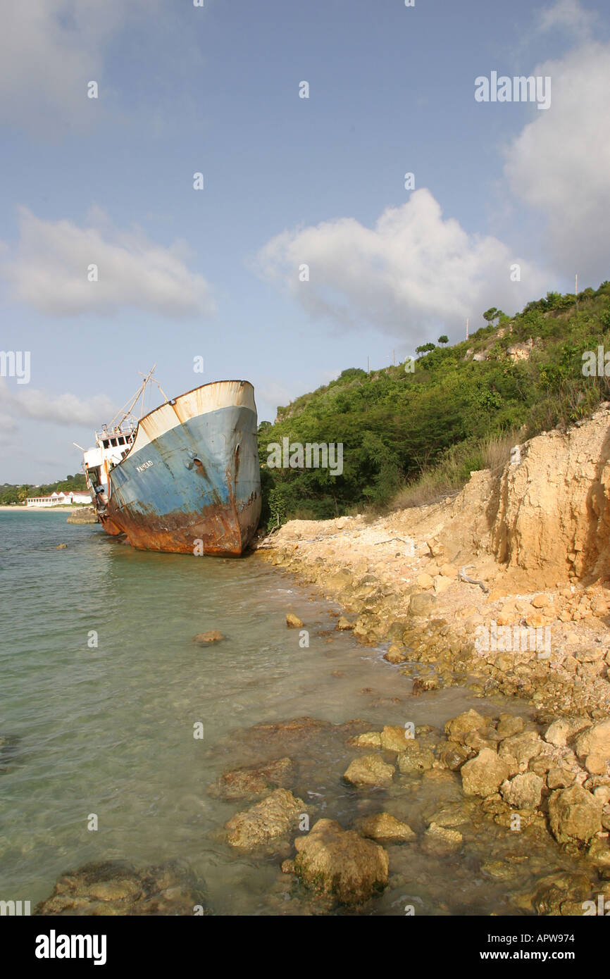 Rusting shipwreck stranded on the beach of Sandy Ground Bay on the ...