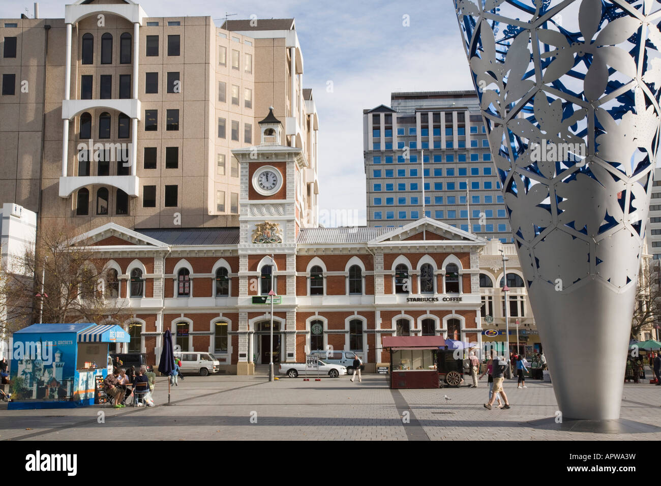 Old Post Office clock tower in "cathedral square" city centre with The