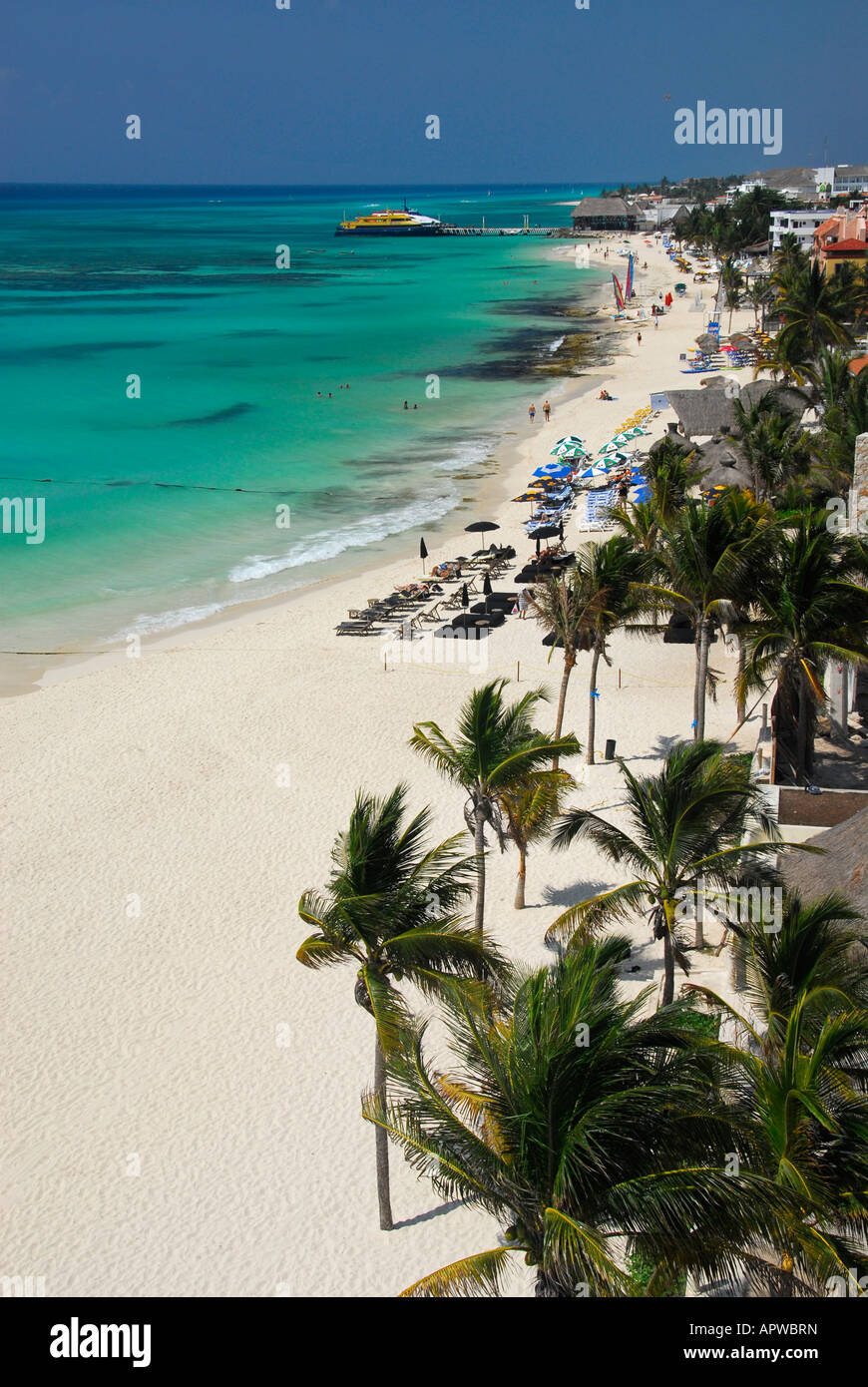Playa del Carmen beach with Cozumel ferry pier in distance, Playa del