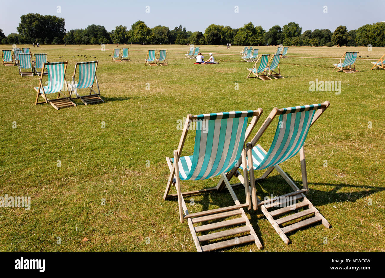 Deck chairs in Hyde Park London UK Stock Photo - Alamy