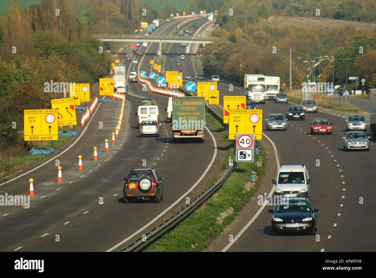 Lane closure signs on dual carriageway for road works and