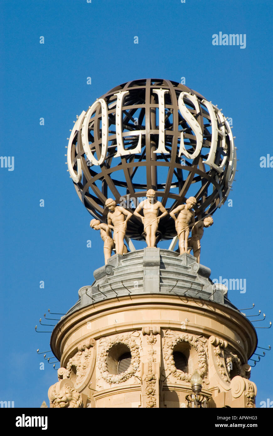 Roof & statues dome of London Coliseum theatre home of English National Opera ENO with revolving globe carries theatre name Westminster England UK Stock Photo