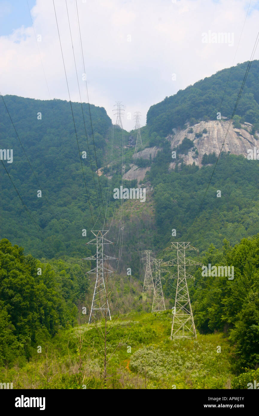 High Tension Electrical Lines Cutting Through the Mountains Stock Photo ...