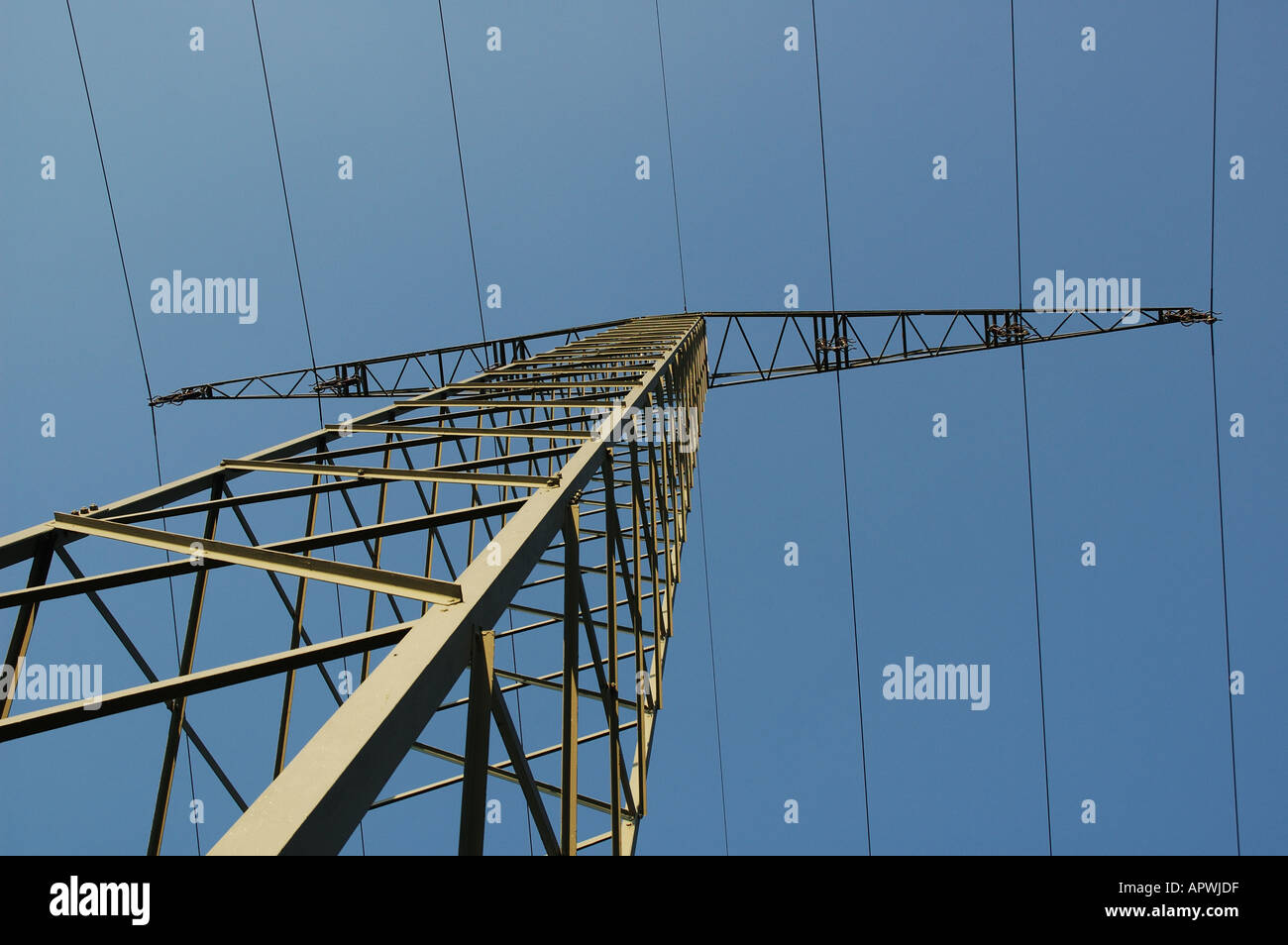 high voltage power line agains blue sky Stock Photo - Alamy