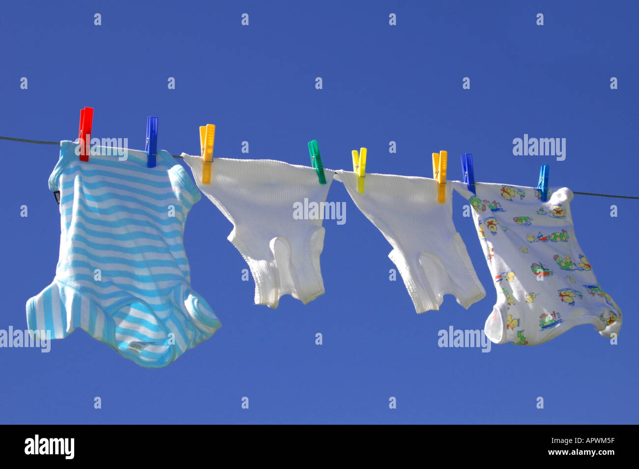 Baby Clothes hanging on a washing line, Australia Stock Photo