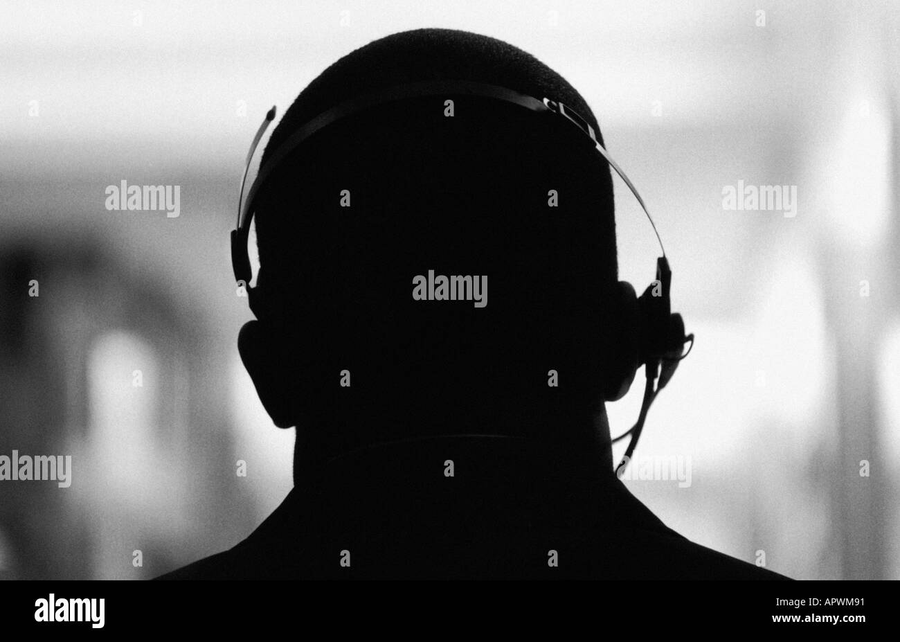 Wearing a headset Black and White Stock Photos & Images - Alamy