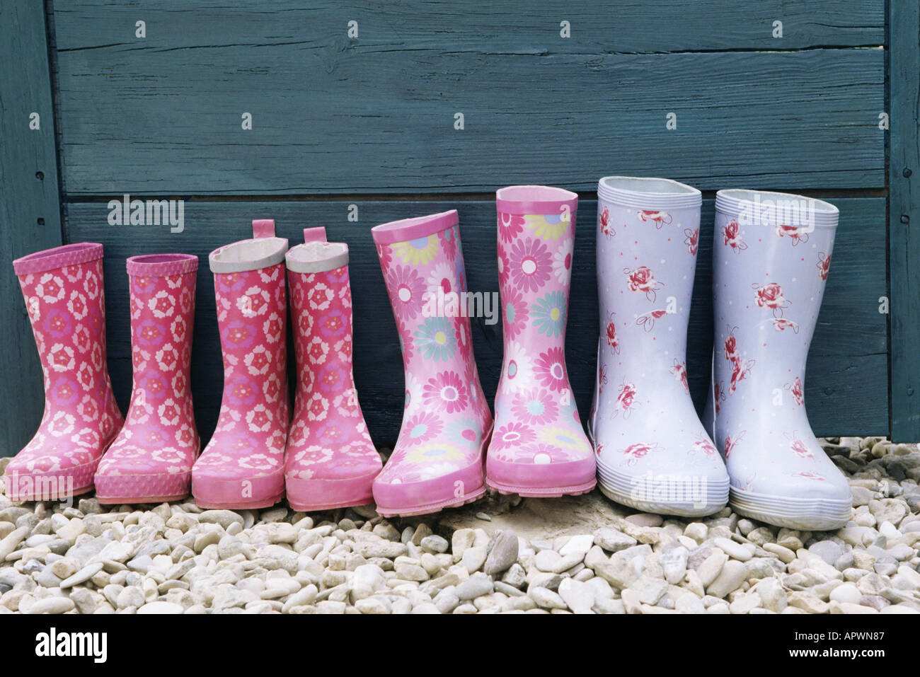 Row of rubber boots Stock Photo - Alamy