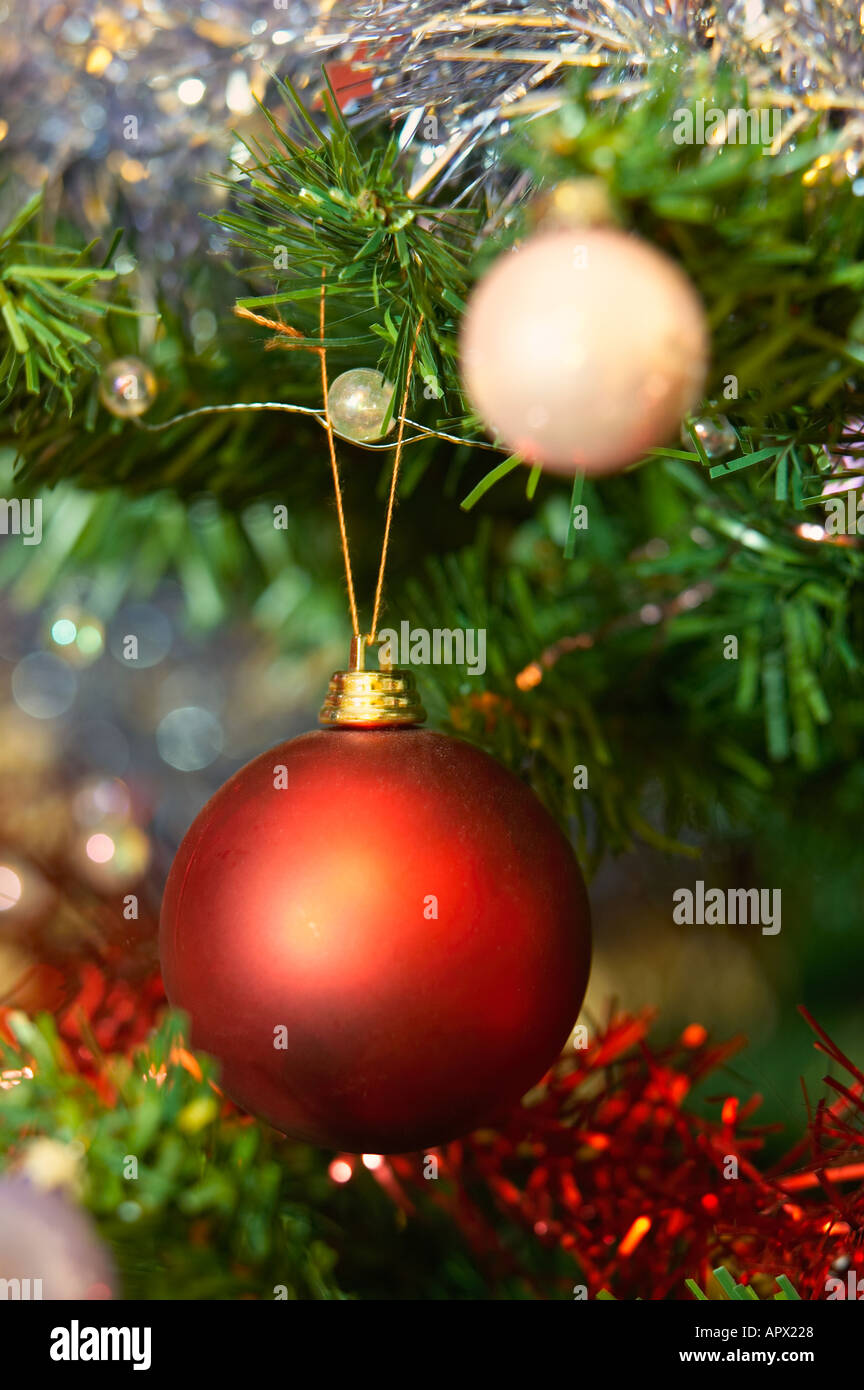 Christmas tree bauble decorations with tinsel Stock Photo