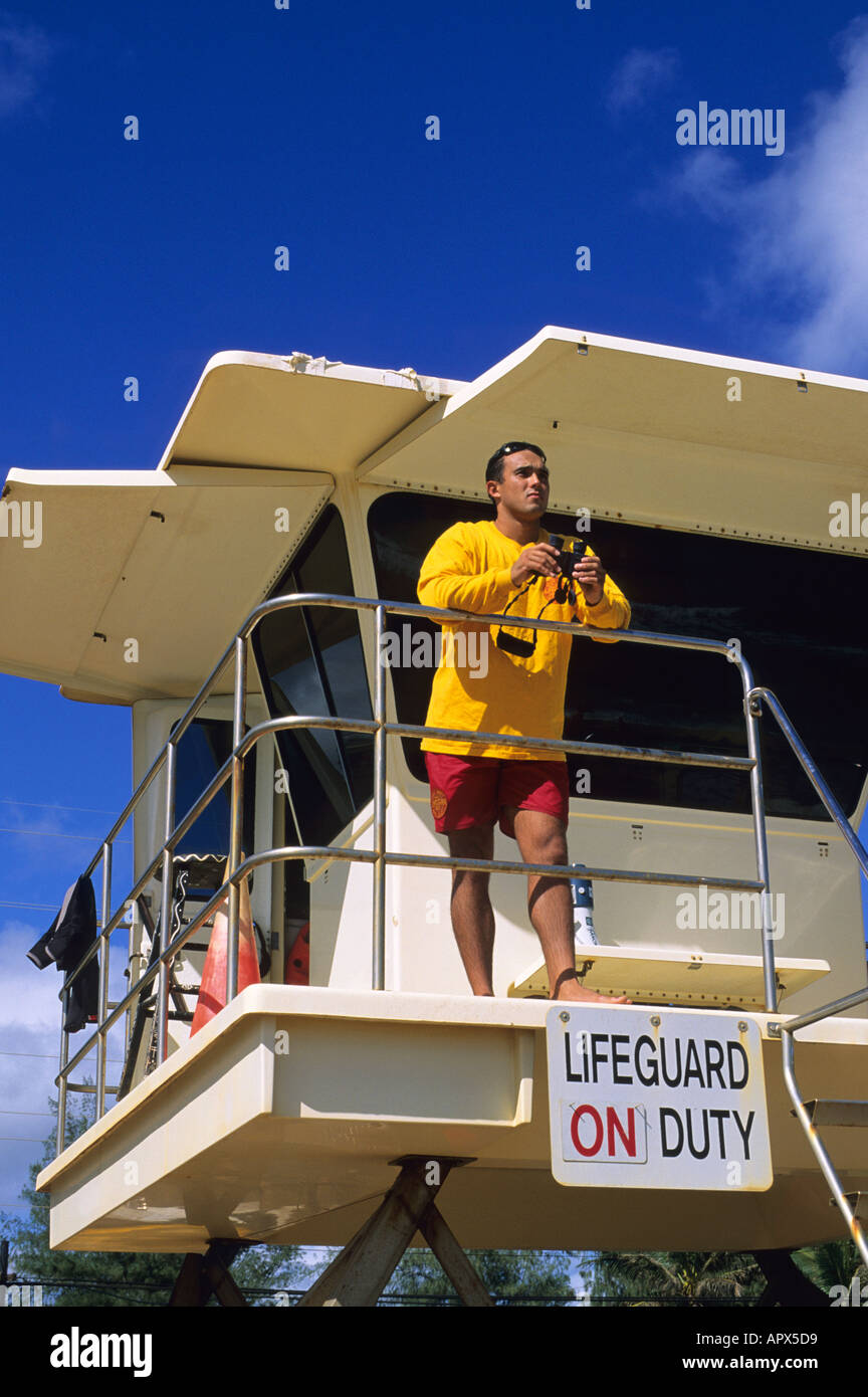 A lifeguard with binoculars in Kauai Hawaii Stock Photo Alamy