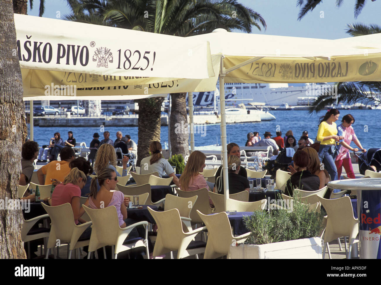 Tourists dining in Riva waterfont restaurant Split Croatia Stock Photo