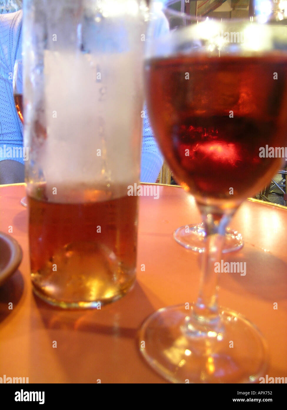 drinks - glass of wine & beer on bar table Stock Photo