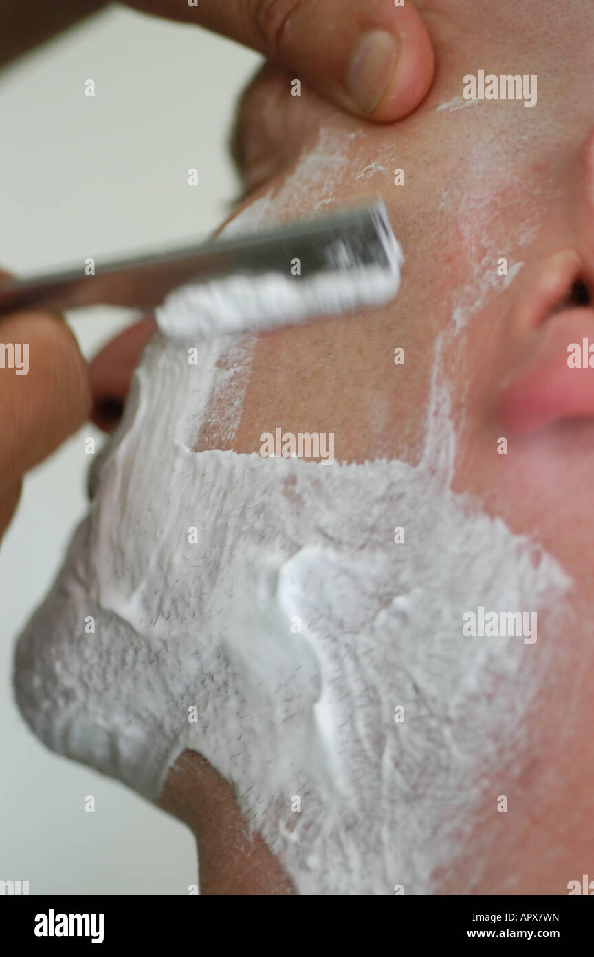 close shave traditional men's grooming with blade and lather Stock Photo Alamy