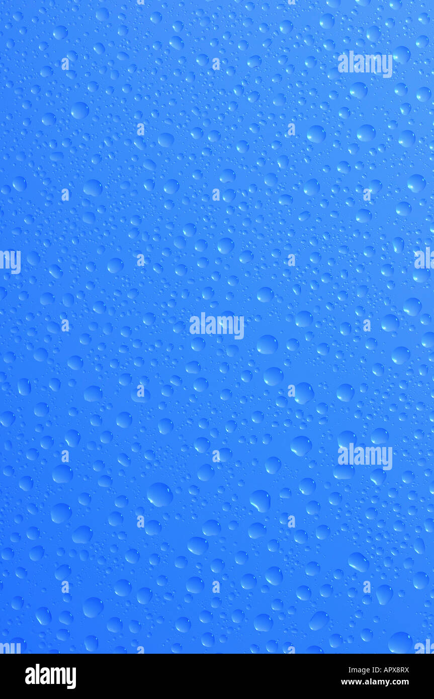 Water Droplets on a Blue Background Stock Photo - Alamy