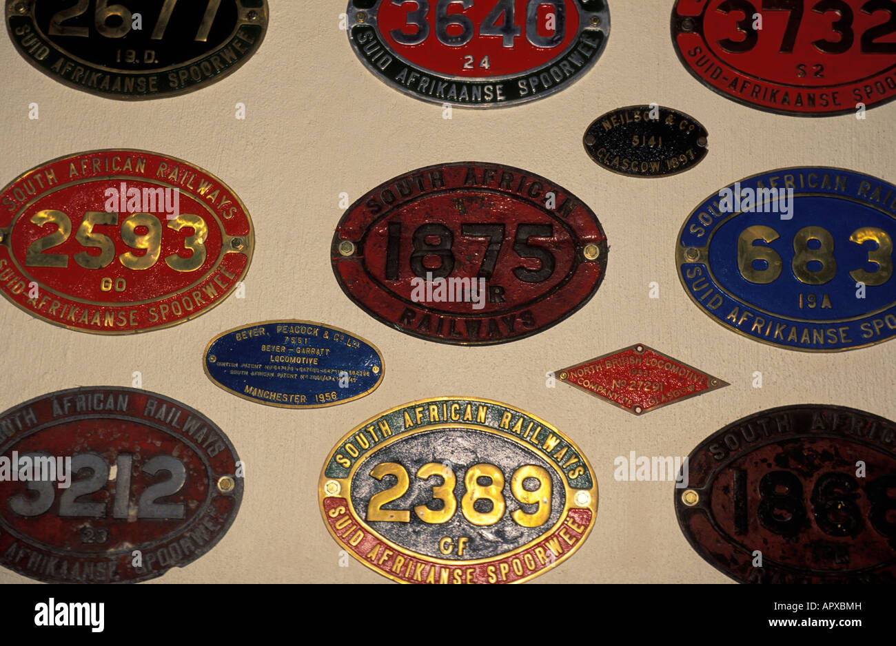 A collection of brass registration plates collected from South African
