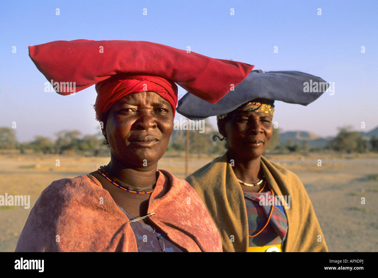 Portrait of two Herero women featuring their unusual head dresses Stock Photo