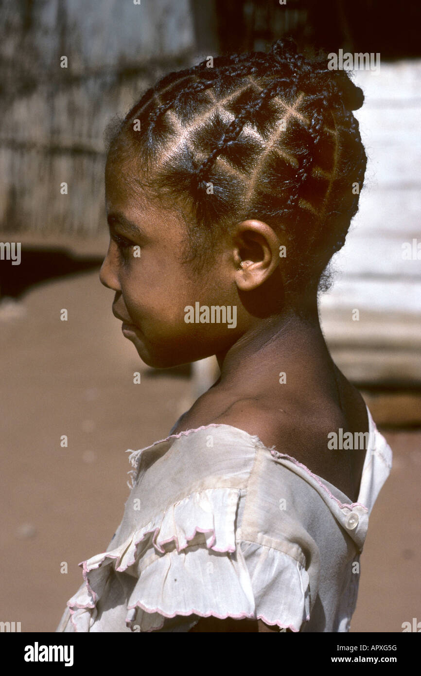 Side View Portrait Of A Young Girl With Elaborate Braided