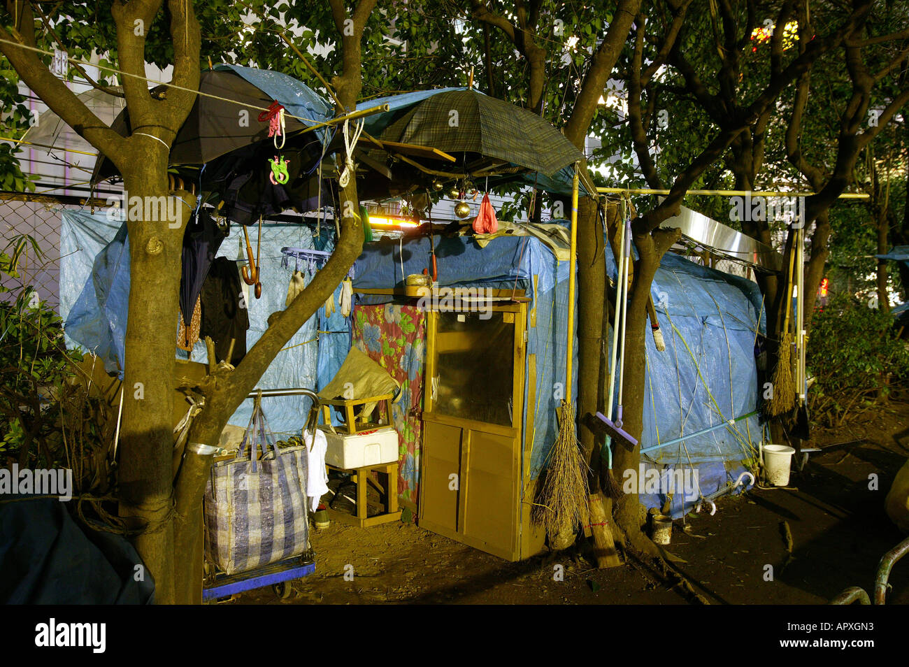 Homeless, living boxes in Tokyo-Shibuya, Japan, Homeless community on a car park roof in Shibuya, self made shelter, architectur Stock Photo