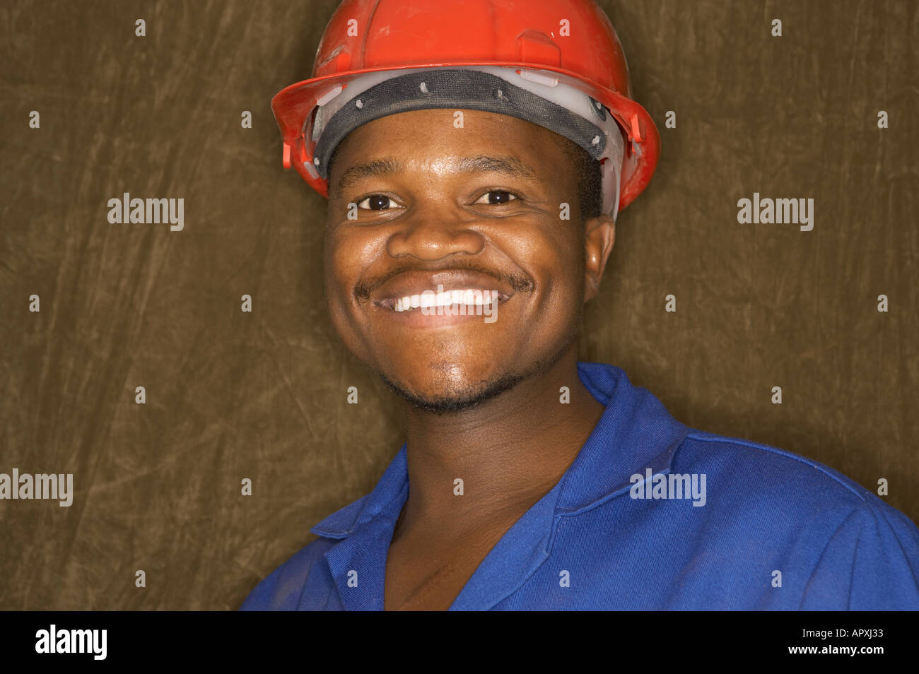 Construction worker with hard hat, South Africa Stock Photo Alamy