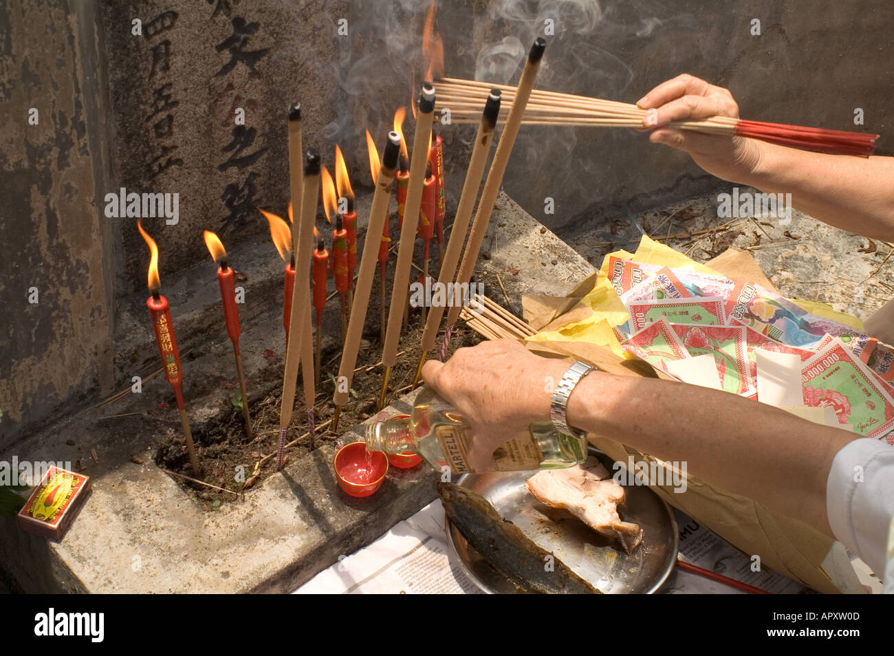 Offerings at ancestors' graves during Qing Ming Festival Malaysia Stock