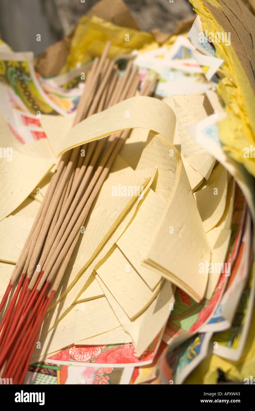 Hell money and josticks ready for burning during the Qing Ming Festival, Malaysia, South East Asia Stock Photo