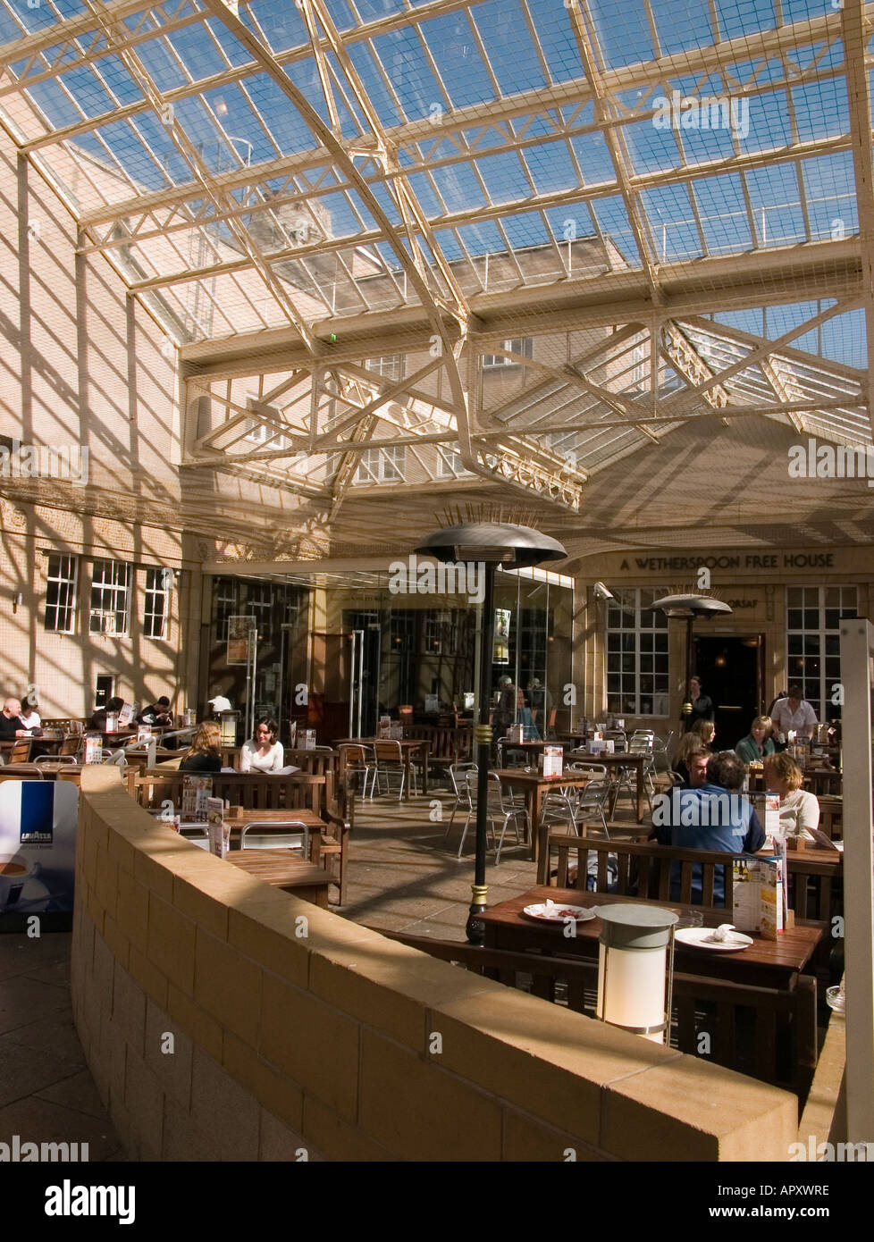 interior aberystwyth railway station with wetherspoons pub in the courtyard april 2005 under a glazed cast iron canopy Stock Photo