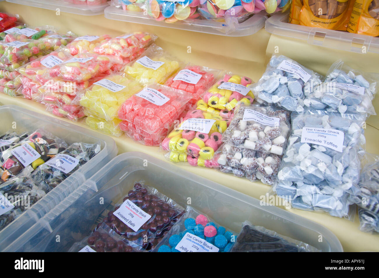 Sweets for sale on a market stall. Merseyway Precinct, Stockport, Greater Manchester, United Kingdom. Stock Photo