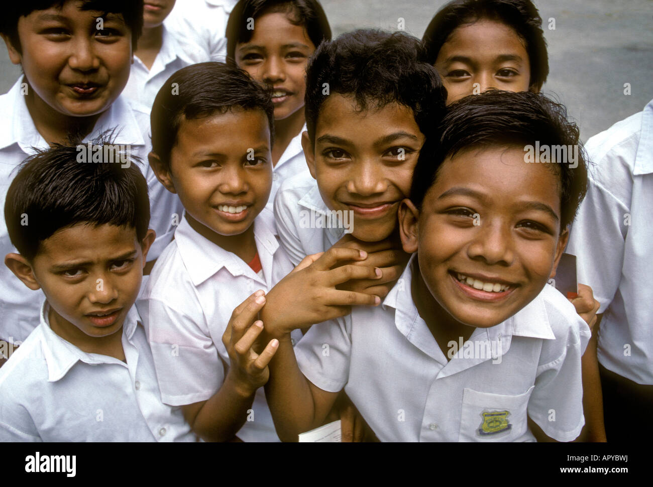 Malaysians, Malaysian boys, boys, students, schoolboys, eye contact, front view, schoolchildren, children, madrasa school, Kuala Lumpur, Malaysia Stock Photo