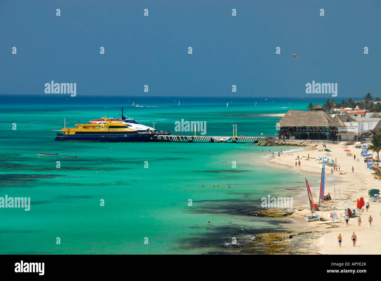 Playa del Carmen beach with Cozumel ferry pier in distance, Playa del Carmen,  Quinatana Roo state, Mexico, North America Stock Photo - Alamy