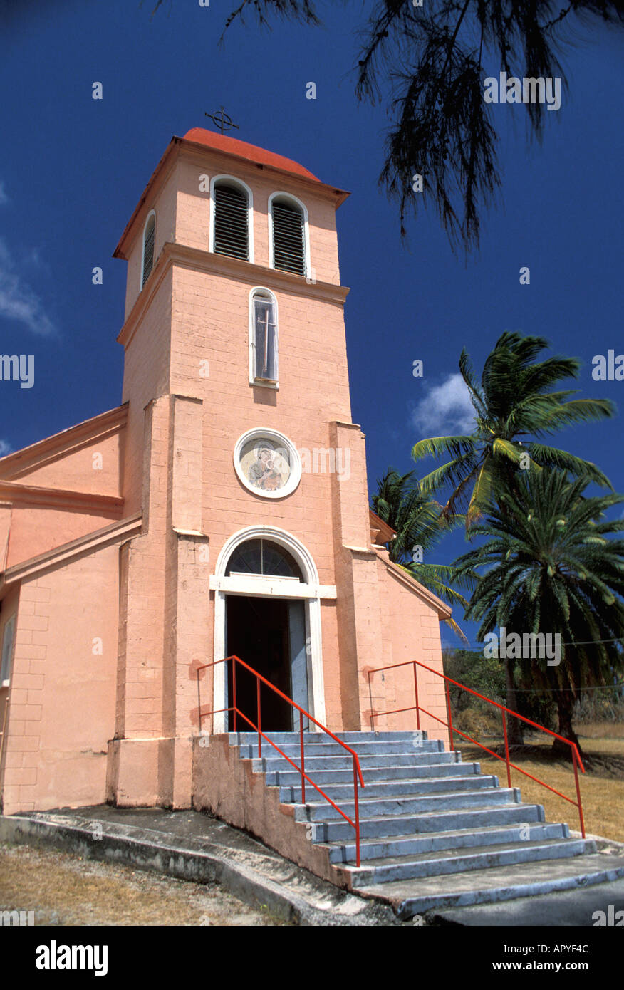 Antigua Colorful Pink Church against Blue Sky Our Lady of Perpetual Help Catholic Church Stock Photo