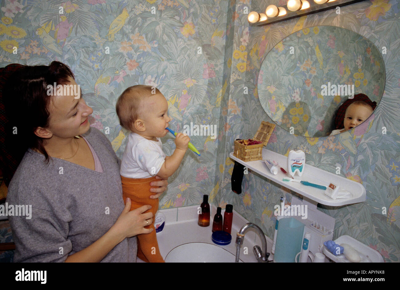 Boy one years old learning how to brush teeth Stock Photo Alamy