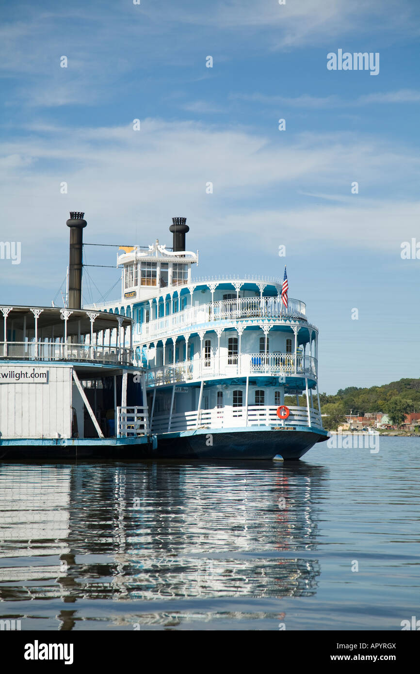 IOWA LeClaire Paddlewheel boat docked at pier on Mississippi River wide expanse of water Stock