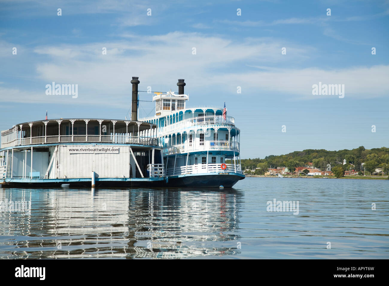 IOWA LeClaire Paddlewheel boat docked at pier on Mississippi River wide expanse of water Stock Photo